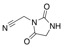 2-(2,5-Dioxoimidazolidin-1-yl)acetonitrile